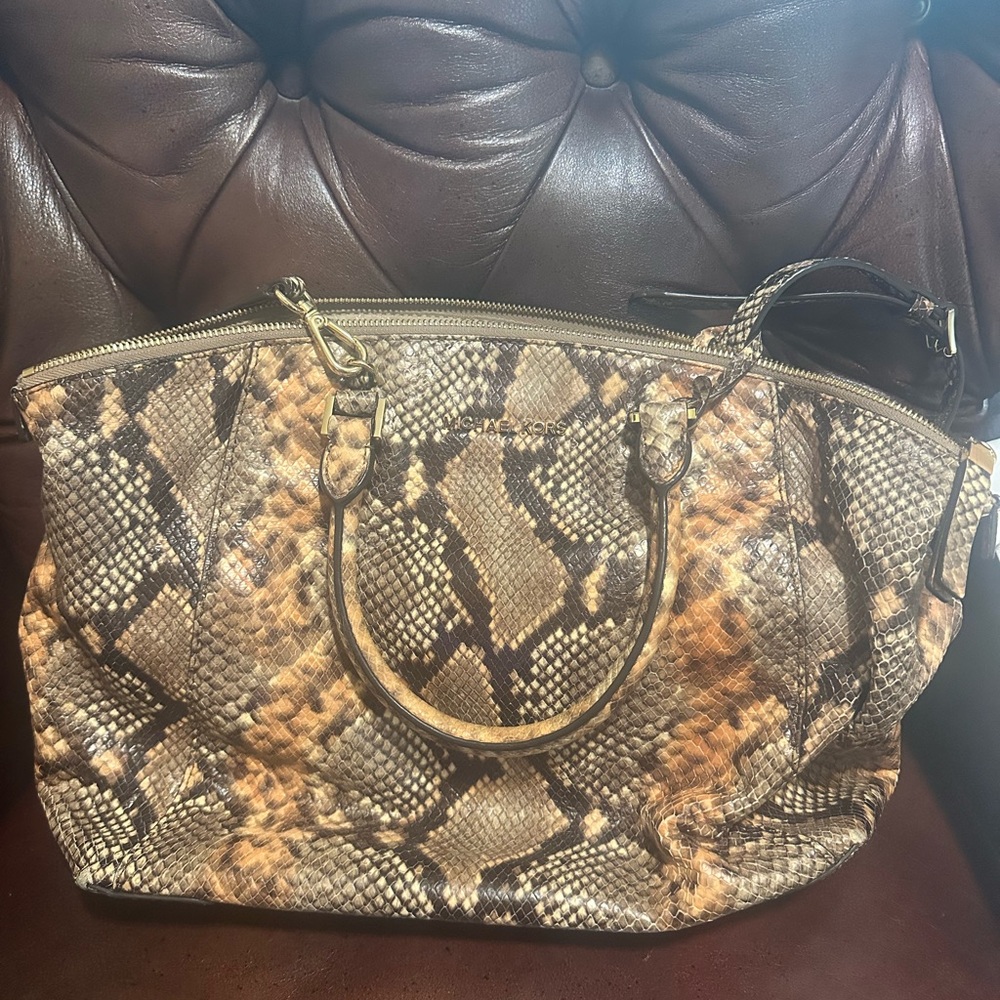 Michael Kors limited edition bag 
Snakeskin Patterned Used a few times.